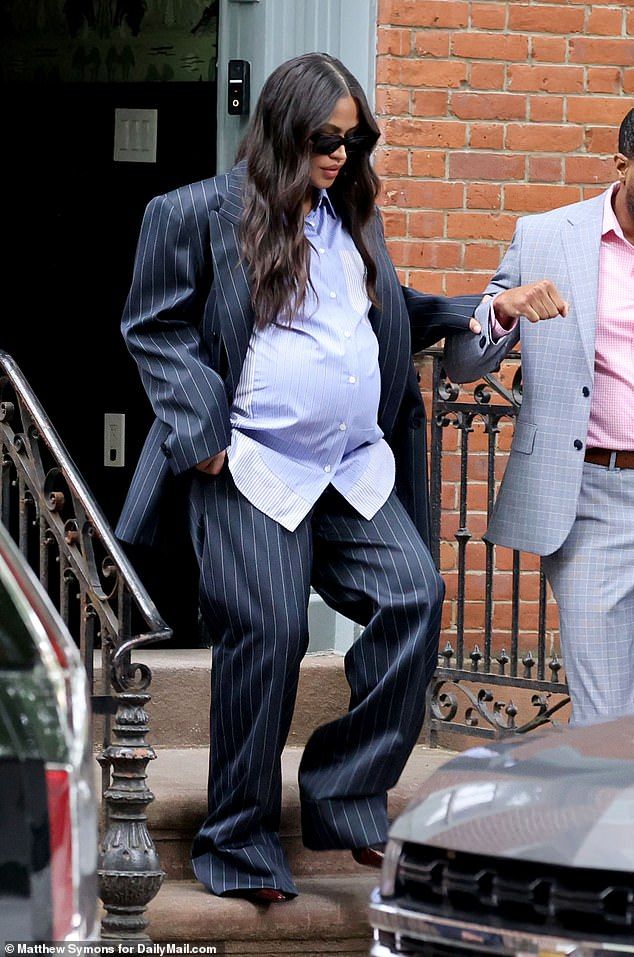 Cassie Ventura leaves her home to head to the Diddy trial, Cassie was escorted down the stairs by a security guard with her pregnant belly on full show. It was the end of Ventura's testimony, which has to be stopped due to her being over eight months preg