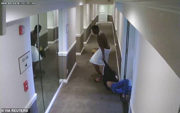 Sean Diddy Combs drags ex-girlfriend Casandra Cassie Ventura in a still image from a March 5, 2016 surveillance video taken in the hallway of a Los Angeles hotel, where a towel-clad Combs threw Ventura to the ground and began to kick her, which was entere