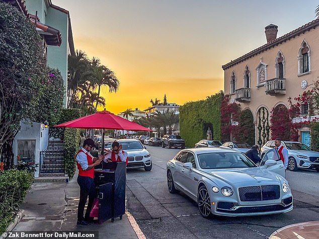 Guests arriving at Renato's in Bentleys and other luxury cars