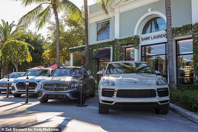The couple were previously pictured having brunch at the Honor Bar, another popular fixture. Above, a row of luxury vehicles are seen parked outside the restaurant