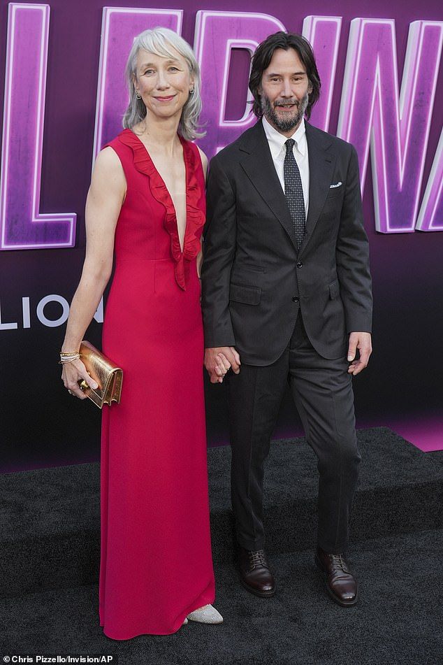 Alexandra wowed in a bold red dress with a plunging, ruffled neckline