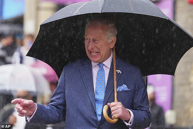 The king looked typically stylish and dapper as he stepped out in a navy pinstripe suit paired with a crisp white shirt, a blue tie and highly polished black shoes