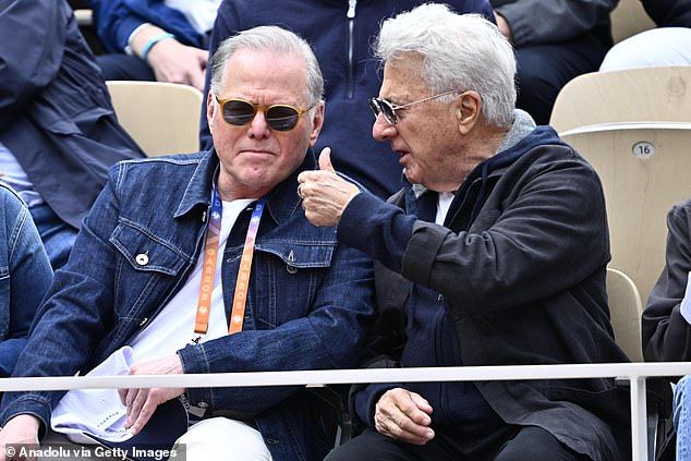 Dustin was seen chatting with theCEO and president of Warner Bros David Zaslav