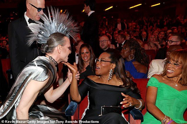 Oprah and the 70-year-old self-described 'astronaut' famously spent the night together the first time they met in 1976 due to a Baltimore snowstorm, but they are not lesbian lovers (pictured with producer Jordan Roth)