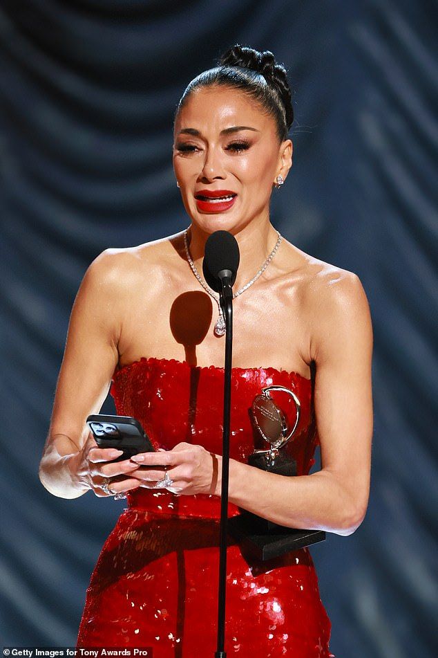 The actress was seen shedding tears as she finally accepted the award - widely considered the most prestigious in American theatre