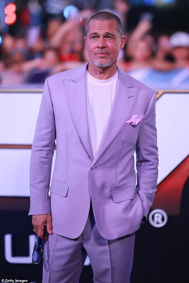 While harking back to the early noughties with his new buzz cut, the Flight Club actor sported a white T-shirt and lilac suit combo which he accessorised with a pair of sunglasses