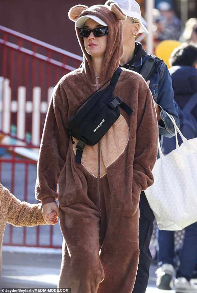 Katy was dressed in a comical bear onesie with round, floppy ears