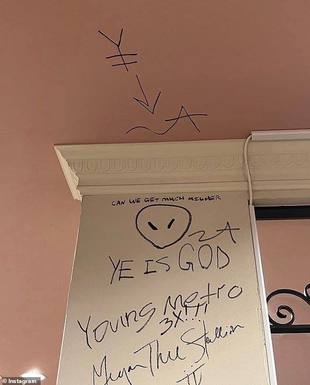 During the trip, an image emerged showing graffiti scrawled on a wall that read: 'Ye is GOD,' while a third, bore the name of Kanye and ex wife Kim Kardashian's eldest child North West