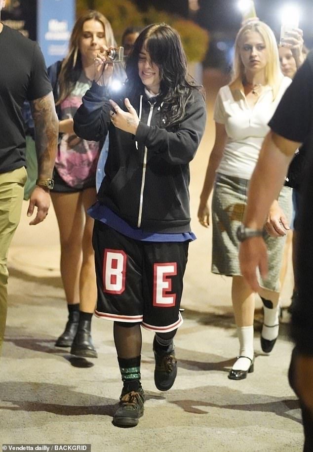 Billie Eilish sported a healthy glow that could have lit up the Eiffel Tower after she dined atop the iconic attraction in Paris on Tuesday night