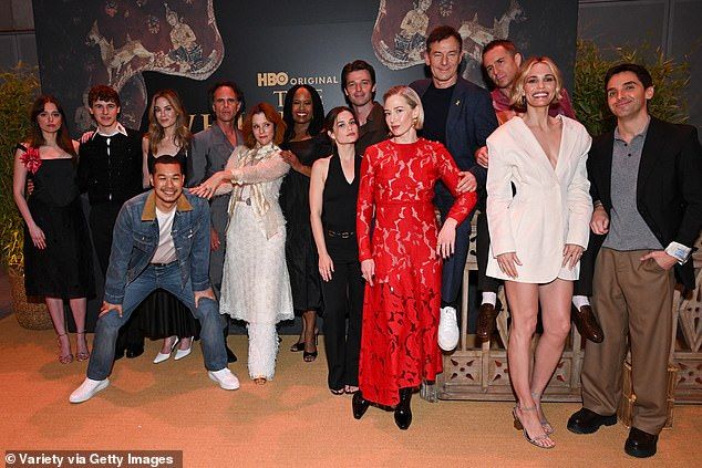 The pair were joined by the rest of the cast for the event as they posed together in a sweet group snap (pictured L-RAimee Lou Wood, Sam Nivola, Tayme Thapthimthong, Walton Goggins, Parker Posey, Natasha Rothwell, Sarah Catherine Hook, Patrick Schwarzeneg