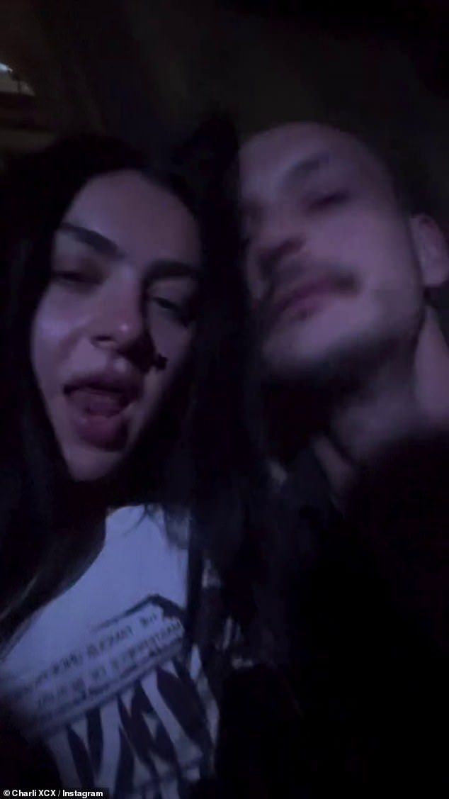 The Brat star, 32, and The 1975 drummer, 34, were seen singing along enthusiastically with the excited crowd at the intimate show in Soho