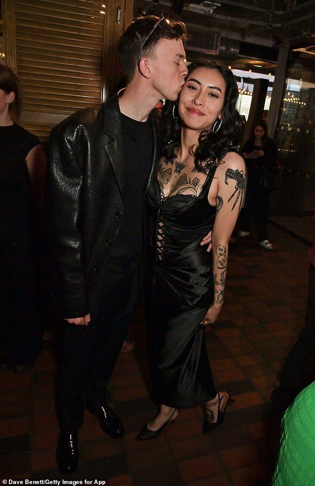 The siblings were joined by Trent's girlfriend, Samayre Soto - with the couple looking utterly smitten as he planted a kiss on her cheek