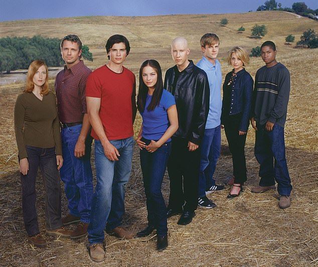 Mack (second from right) starred for years as Chloe Sullivan - the best friend of a young Clark Kent - in TV series Smallville