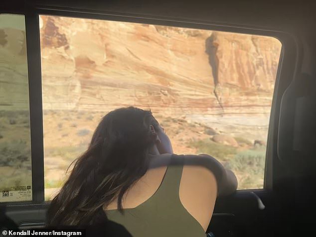 Jenner also shared a snippet showing her wearing a green tank top while leaning out of a car window