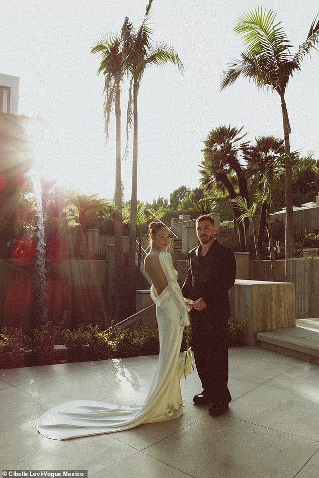Shannon looked dapper in a black Amiri suit over a matching tee while the Texan beauty wore a backless white-silk halter gown by Danielle Franke and vintage Christian Louboutin heels