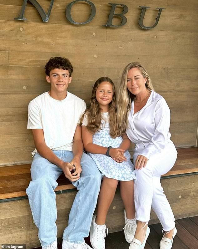 Kendra pictured withson Hank Baskett IV, 15, and daughter Alijah, 11, on her 39th birthday in 2024. She shares her kids with ex-husband Hank Baskett