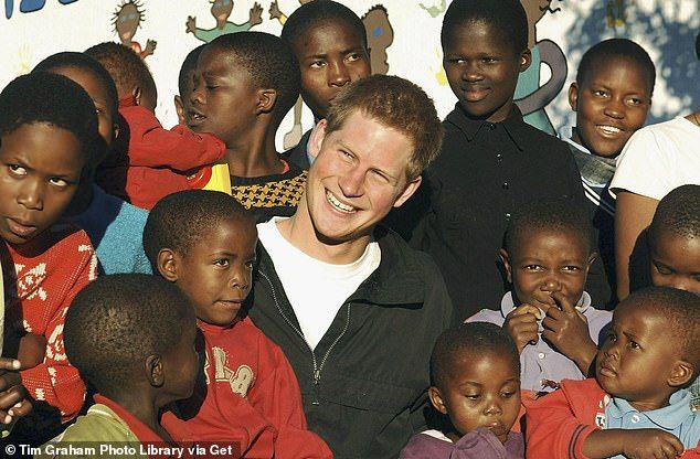 Prince Harry with children from Lesotho following the launch of his charity Sentebale in 2006.It was widely seen as the charity perhaps closest to Harry's heart