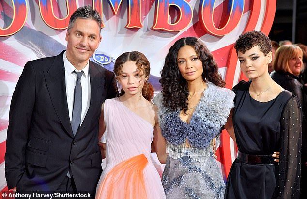 Nico pictured with her mother Thandiwe Newton and father Ol Parker in London in March 2019, with sister Ripley, now 23