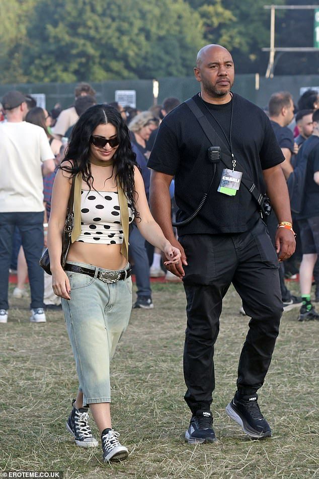 Charli screamed to the crowd 'You ready?' and yelled with autotune 'Put your hands up' as her she sang her hits
