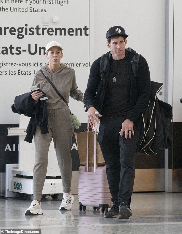 Over the weekend, Tarek and his Heather Rae El Moussa were spotted leaving Toronto after attending a wedding of Heather's best friend (seen on Sunday)