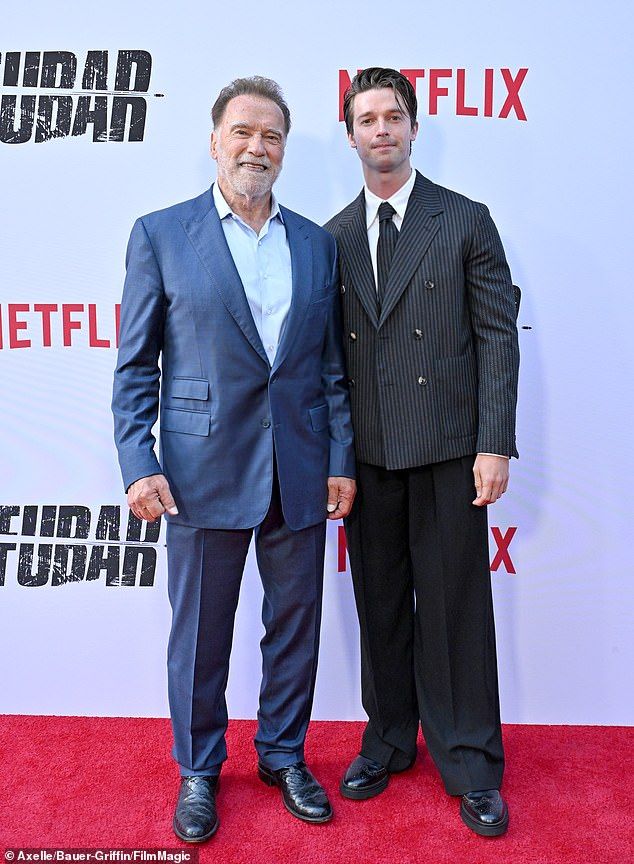 The former California Governor beamed with pride as he posed with Patrick on the red carpet of his FUBAR season two premiere, which was held at Netflix Tudum Theater in LA last Wednesday