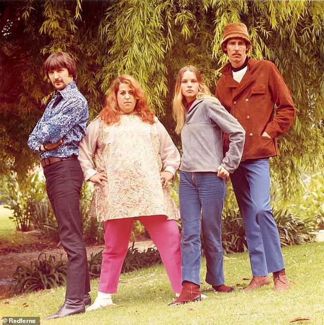Phillips had a tumultuous relationship with her ex-husband and fellow band member John Phillips (right). John, who died in 2001 at the age of 65, infamously had an affair with Cass Elliot (center), the band's other female vocalist, which created tensions 