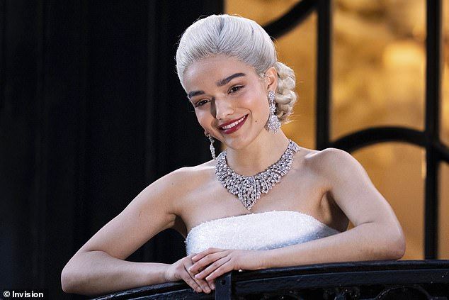 For her performance of the iconic song, Rachel donned a white strapless dress and sported a platinum blonde wig styled into a chignon
