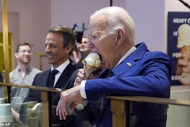 Asked about the trend of politicians appearing on comedians' podcasts and whether he was 'envious,' Meyer's said he and his contemporaries had already 'weaned [them]selves off politicians' as guests. Pictured, Joe Biden eating ice cream in 2024 while in N