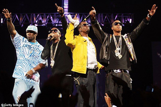 50 Cent, Kanye, Sean 'Diddy' Combs and Jay-Z pictured onstage in NYC's Madison Square Garden in August of 2007
