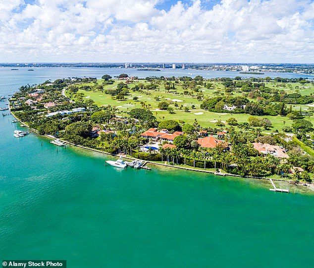 Brady and the Amazon founder are neighbors on the VIP enclave, Indian Creek Island