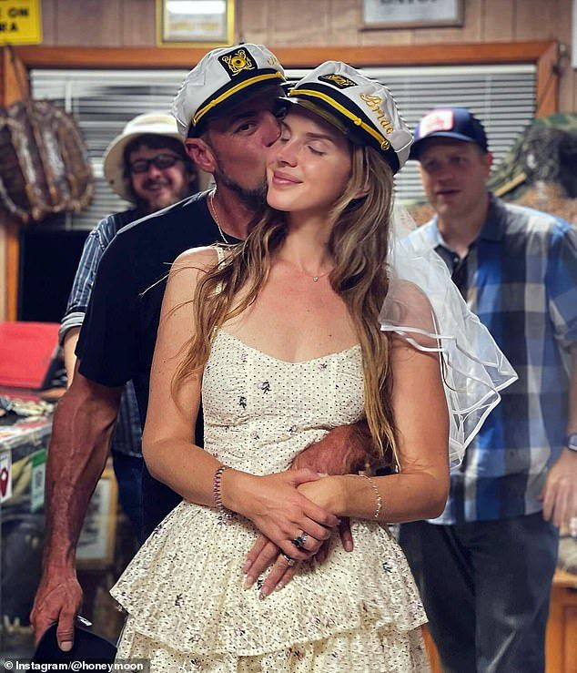 During her show, the 40-year-old singer songwriter stopped mid-performance on Monday to run up to her husband, who was standing backstage