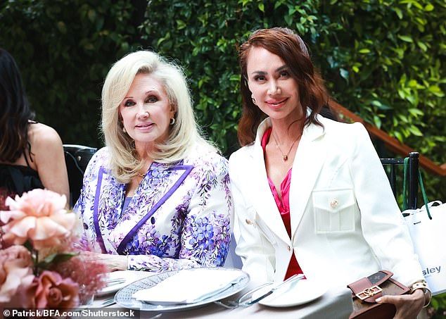 Mork & Mindy star Morgan, 75, also milled around the star-studded event and cut a vibrant figure in a purple patterned blazer and matching lilac trousers