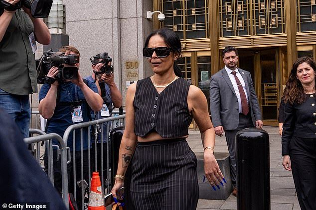 The kidnapping theory stems from Combs' former assistant Capricorn Clark's testimony, where she said she was kidnapped by Combs, who was armed with a gun, and driven to Mescudi's home while he allegedly entered the residence. (Pictured: Clark leaving cour
