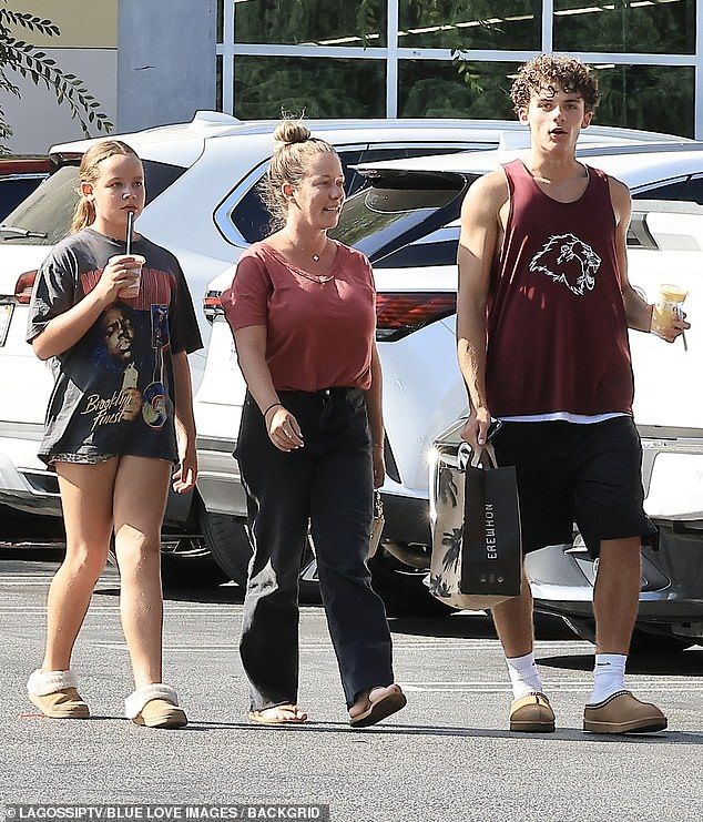 Playboy vet Kendra Wilkinson made an Erewhon run with her two kids, Hank IV and Alijah, on Tuesday. Her 15-year-old son towered over her 5'4 frame