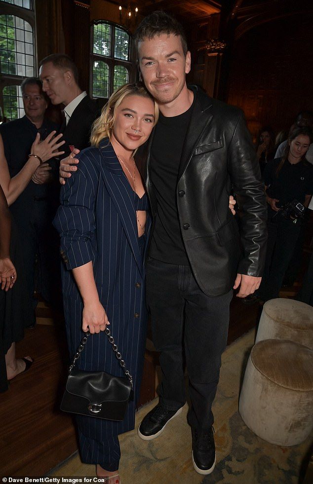 The actress, 29, cut a cool figure as she posed alongside her former Midsommar co-star Will Poulter at the cocktail party honouring Stewart's recent OBE award
