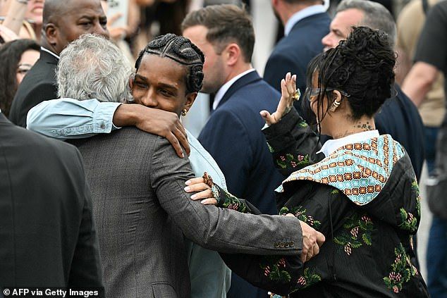 The rapper was seen greeting a fellow attendee at the show