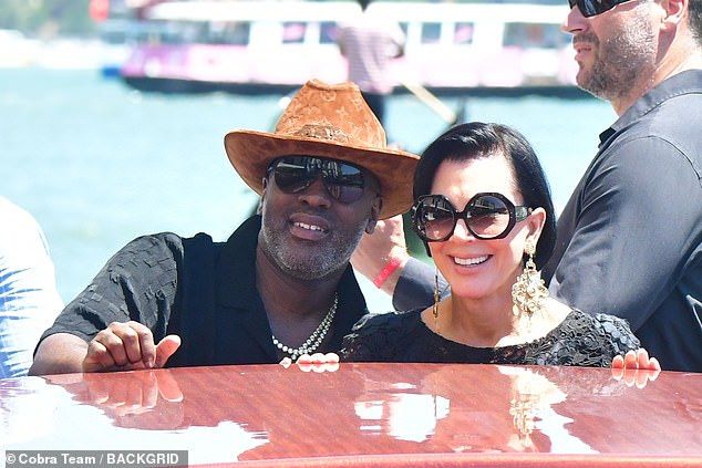 The Kardashian matriarch looked effortlessly chic in a black lace long-sleeve dress