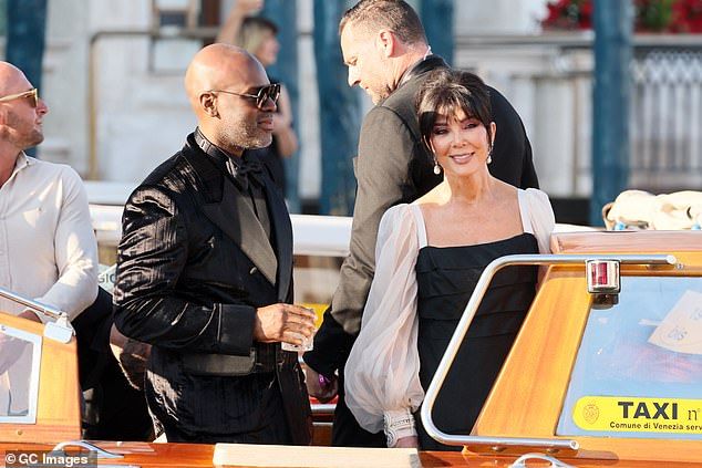 Kris and Corey were beaming as they made their way to the stylish venue