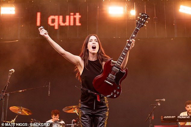 Meanwhile, Danielle looked effortlessly cool in a black racer-neck top and matching leather trousers as she got the crowd going