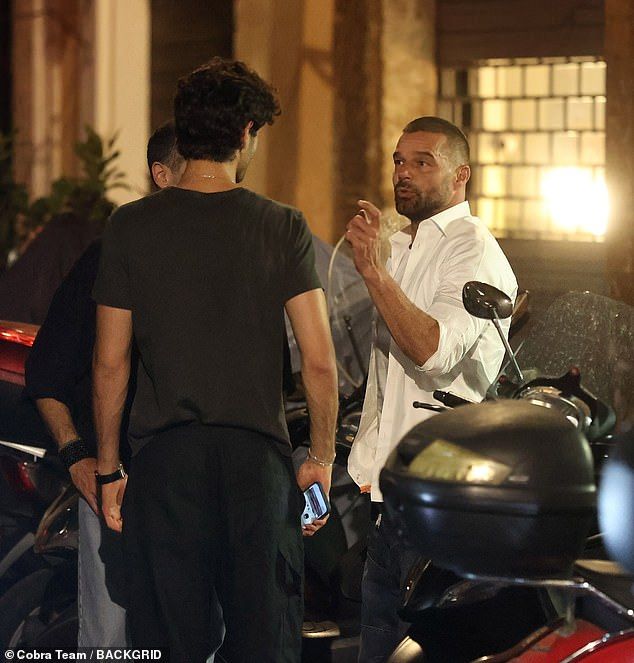 It was Martin's last night in Italy. 'Ciao Roma!' he wrote in his Instagram Stories on his way to the airport