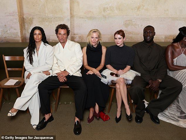 During Paris Men's Fashion Week on Sunday, they were deep in conversation while actress Gillian Anderson was sandwiched between them