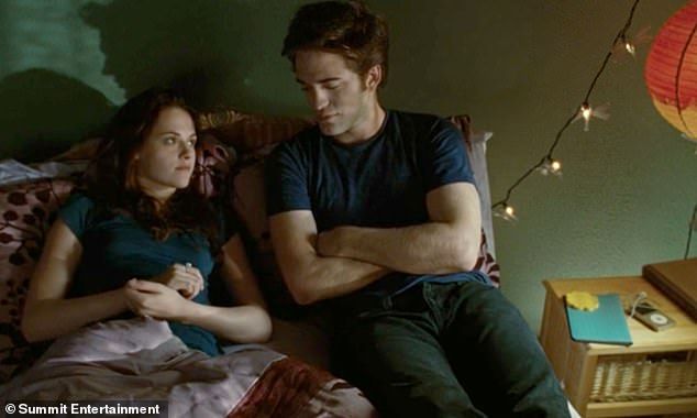 Bella is seen in the same bedroom with her vampire crush, Edward, in a scene from the film