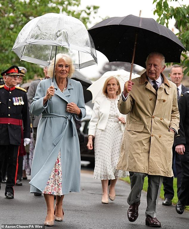 Pictured:King Charles and Queen Camilla arrive to unveil a Commemorative Cairn to mark the centenary of the Kirkcaldy War Memorial