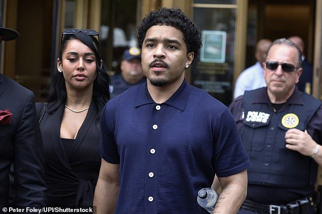 Although Diddy's six oldest children  Quincy Brown, 34; Justin Combs (pictured), 31; Christian 'King' Combs, 27; Chance Combs, 18; and twins D'Lila and Jessie Combs, 18  all showed their support by attending court on Wednesday, most of them stayed silent 