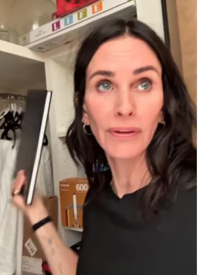 'This closet is making me so anxious, OK, what else do we have... sheets I'm never gonna use,' before revealing a Friends coffee table book.