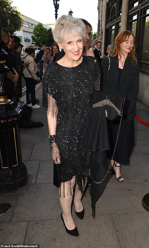 Anita Dobson put on a glamorous display in a fun sequinned black dress teamed with matching netted gloves