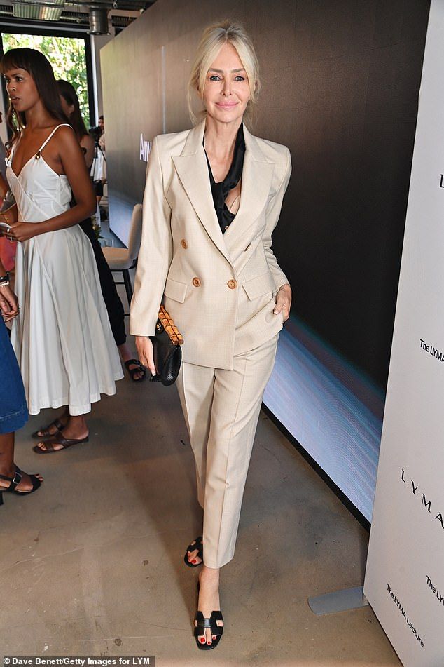 Elsewhere, Amanda Cronin stole the show in a classy beige suit featuring a risky top underneath
