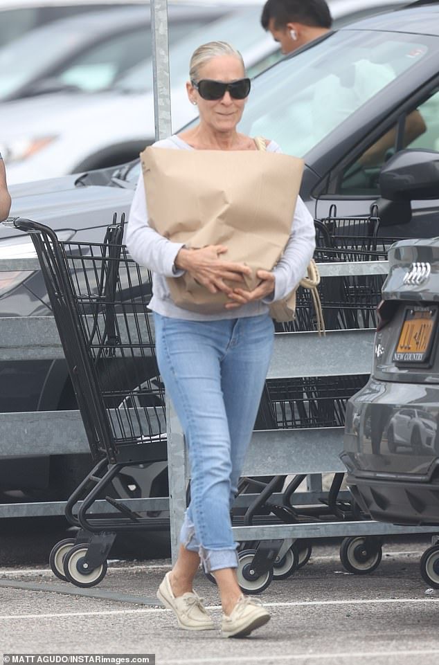 The Carrie Bradshaw icon, 60, who has played the fashionista since the first season of Sex and the City in 1998, pursed her lips and looked somber as fans declared they were 'hate watching' the reboot's third season