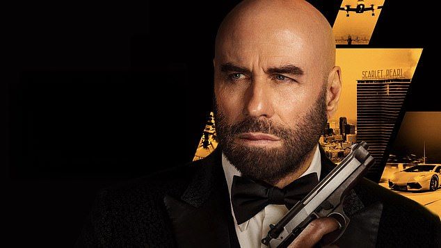 The poster for Travolta's latest film High Rollers, in which he playsMason Goddard, amaster thief who must pull off a dangerous casino heist when his nemesis kidnaps his lover