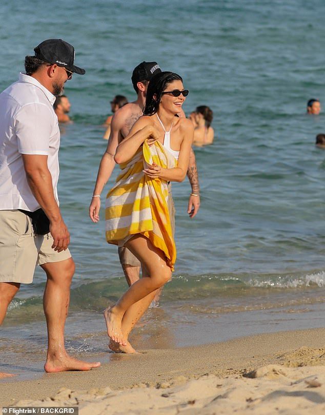 She topped up her tan while on the beach